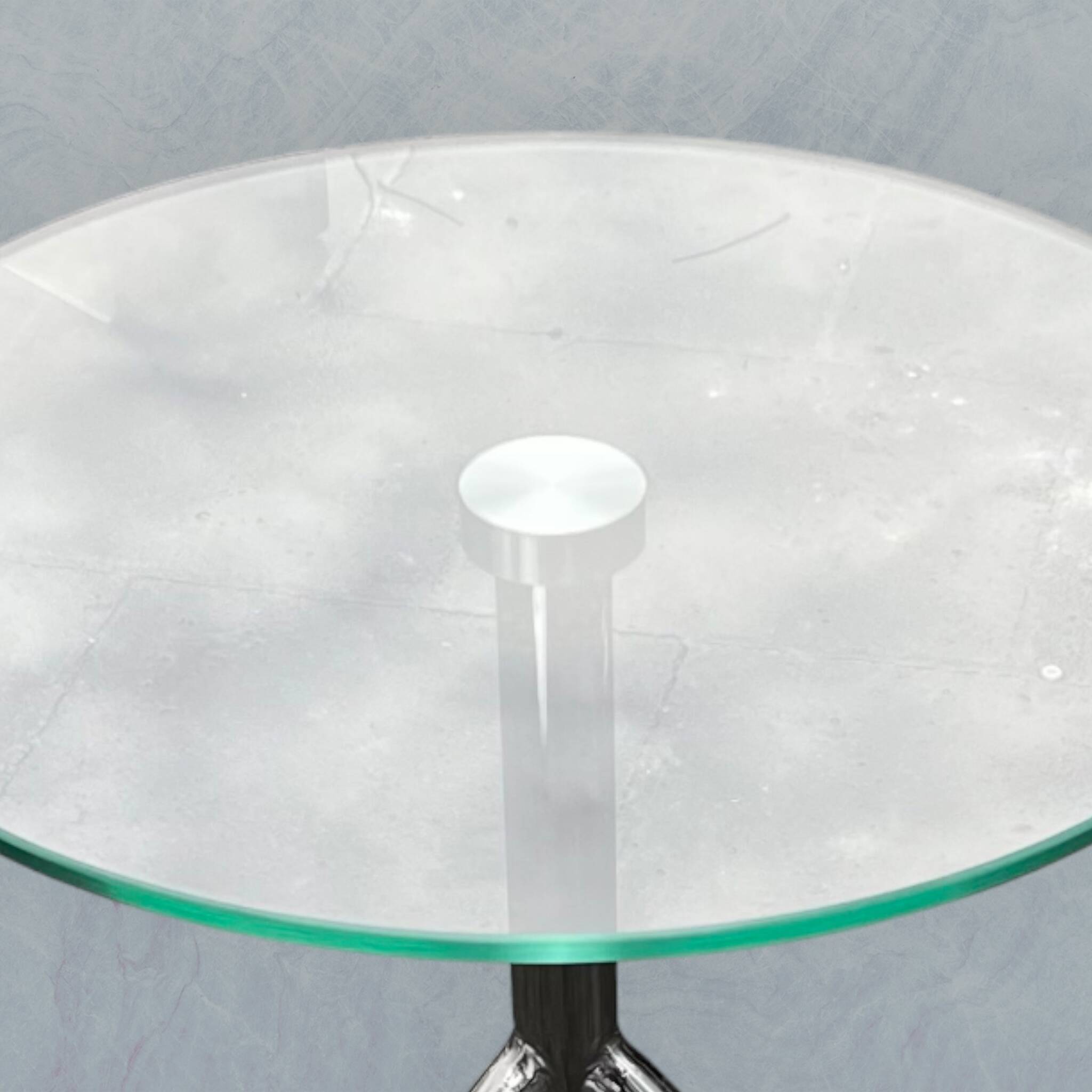 Modernist tripod side table in tempered glass and chrome metal.