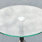 Modernist tripod side table in tempered glass and chrome metal.