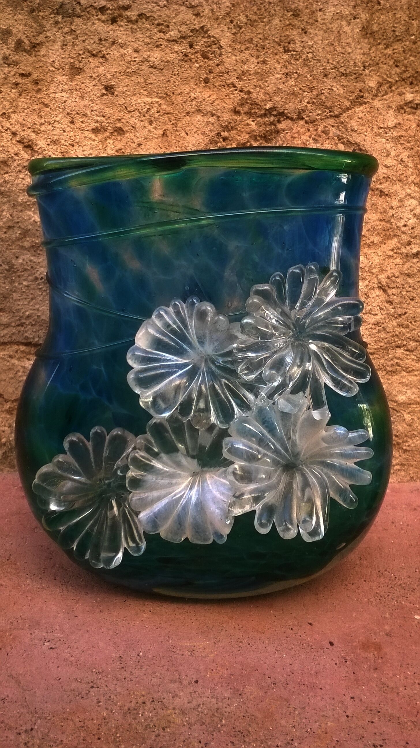 Vase has flower decoration
