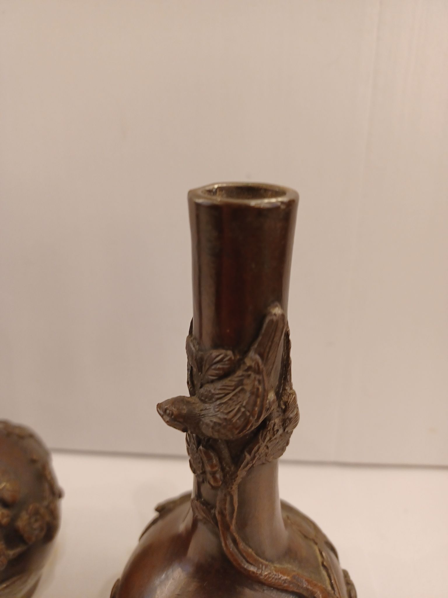 Pair of bronze soliflore vases. Japan, 19th century.