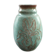 Turquoise vase with iris decoration
