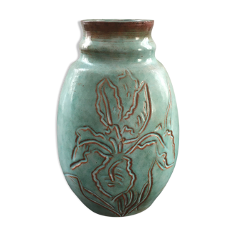 Turquoise vase with iris decor