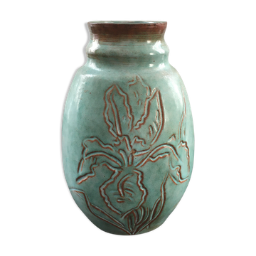 Turquoise vase with iris decoration