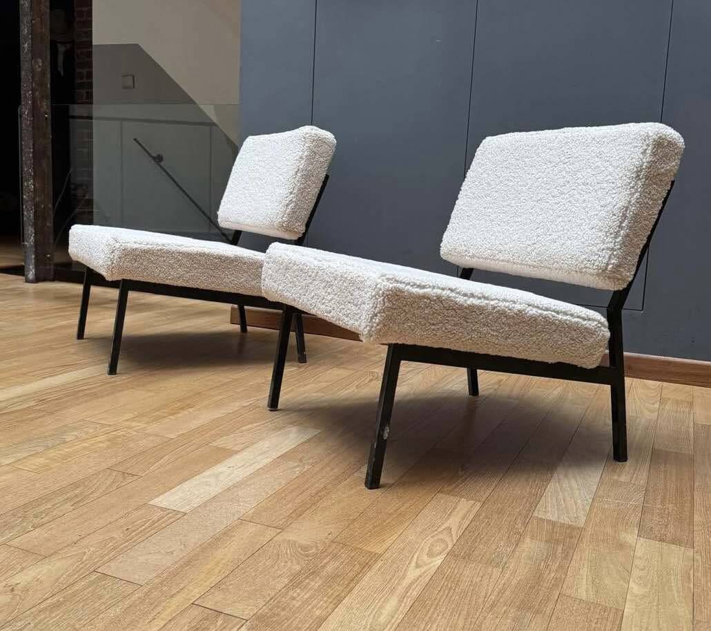 Pair of vintage armchairs, black metal and sheepskin fabric, France 1950.