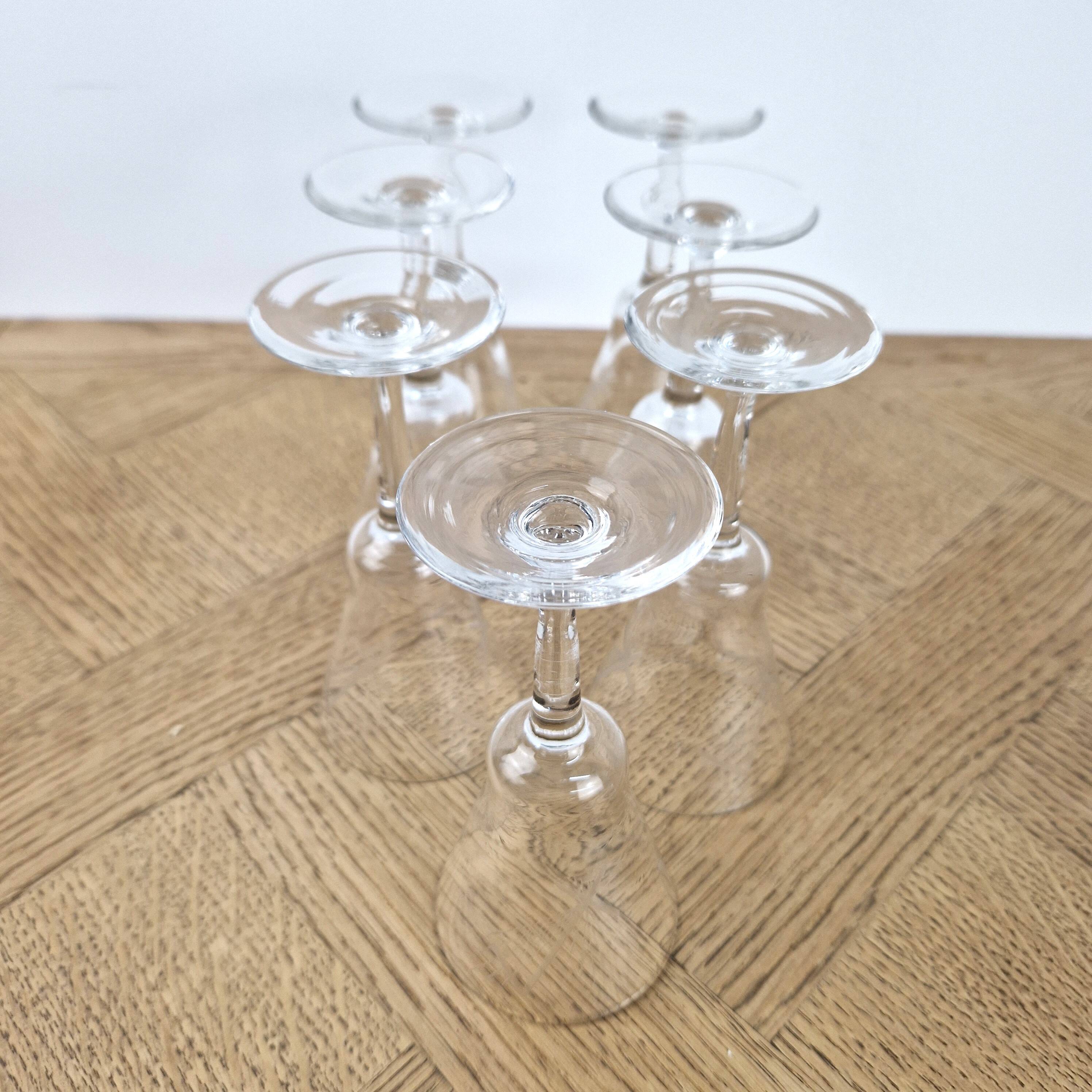7 crystal footed glasses, antique white wine glasses.