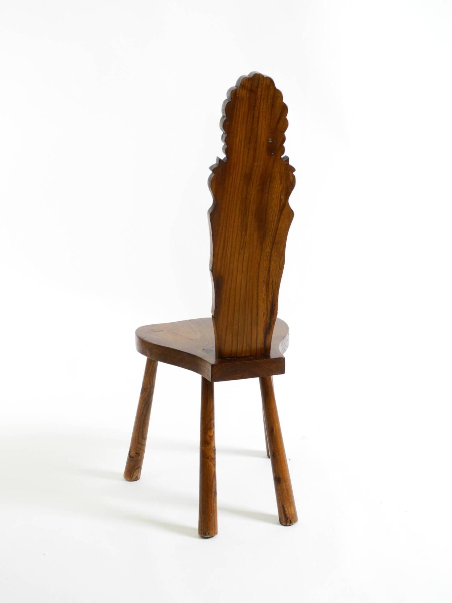 Solid wood chair with an ornate, hand-carved backrest – Made in Spain