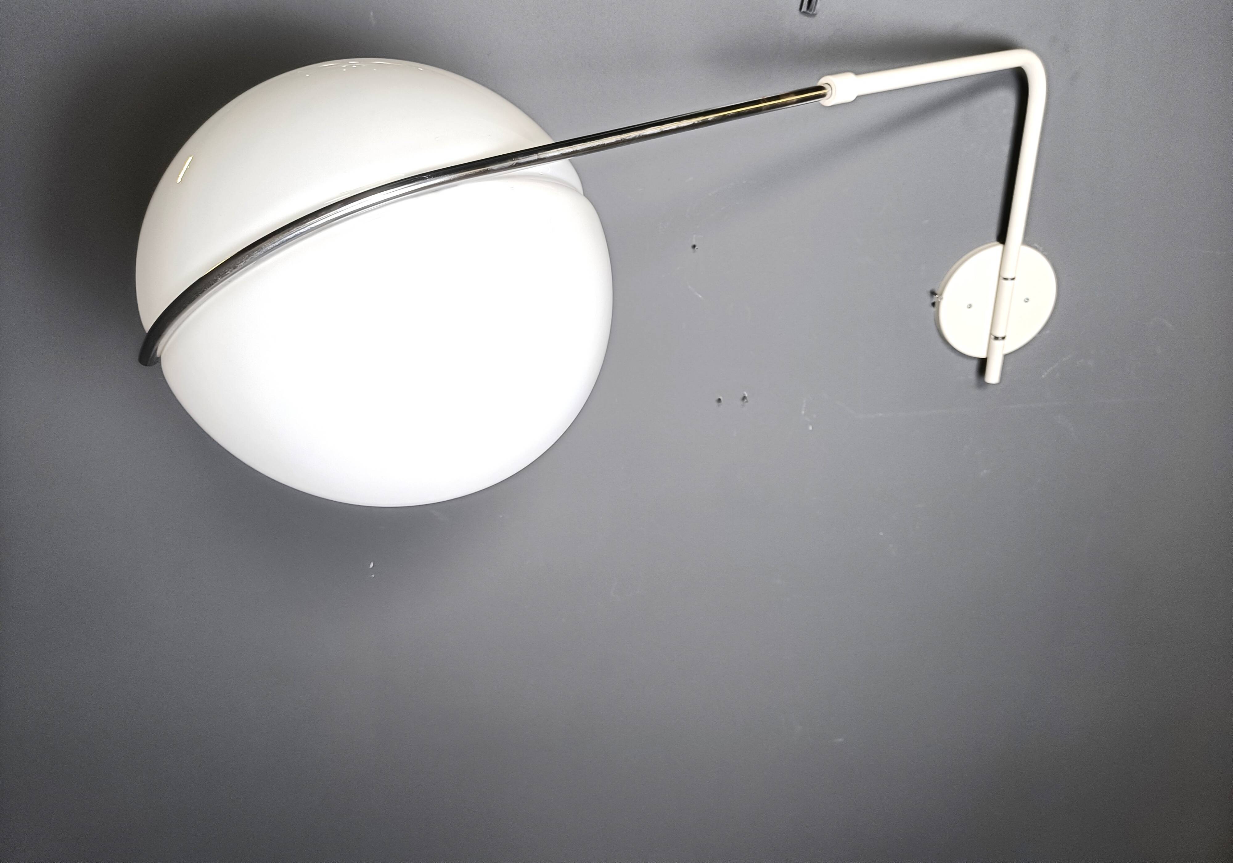 Vintage wall lamp by Luigi Massoni for Guzzini, 1970s