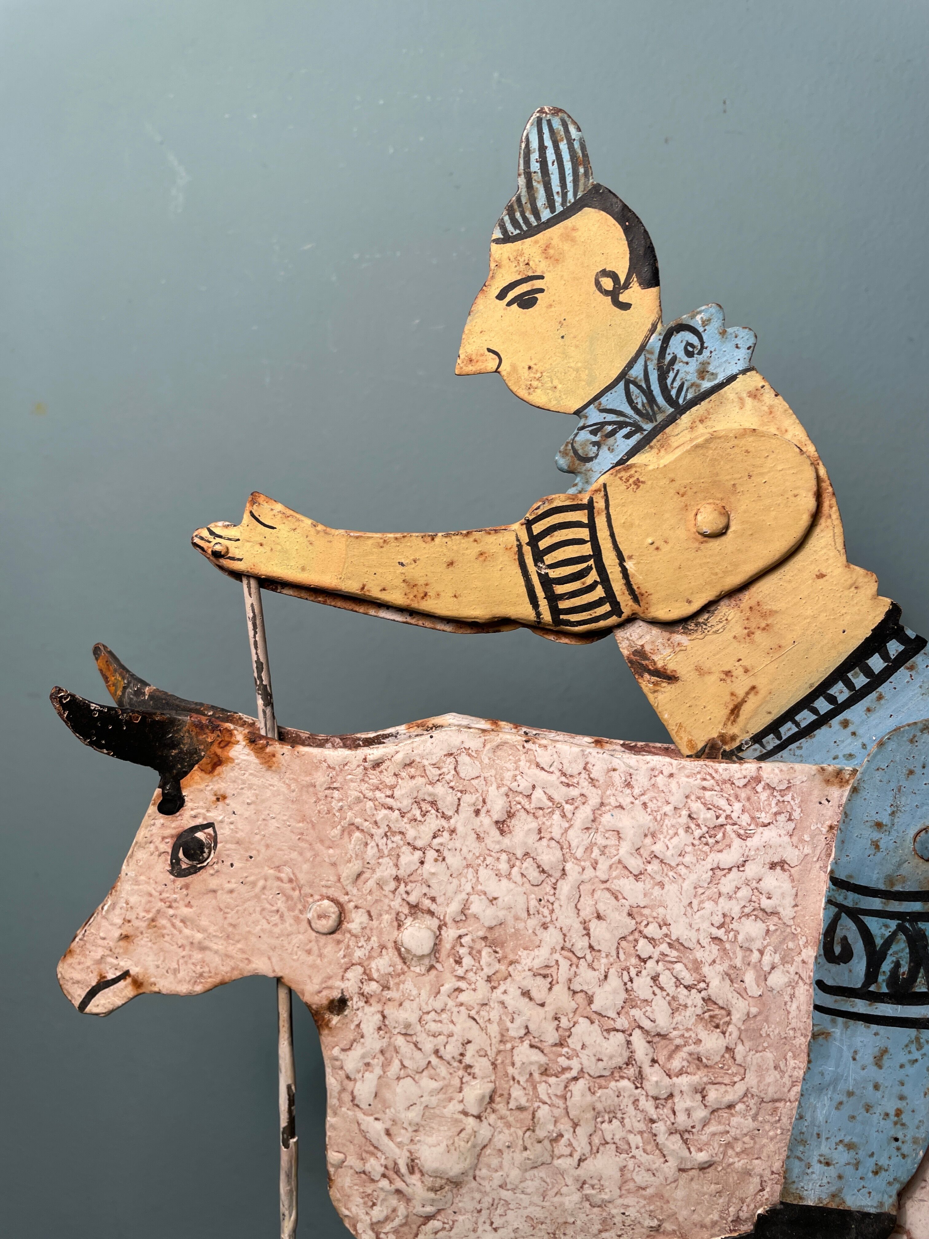 Old painted metal pulling toy