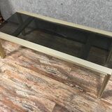 Design coffee table in gilded metal and tinted glass