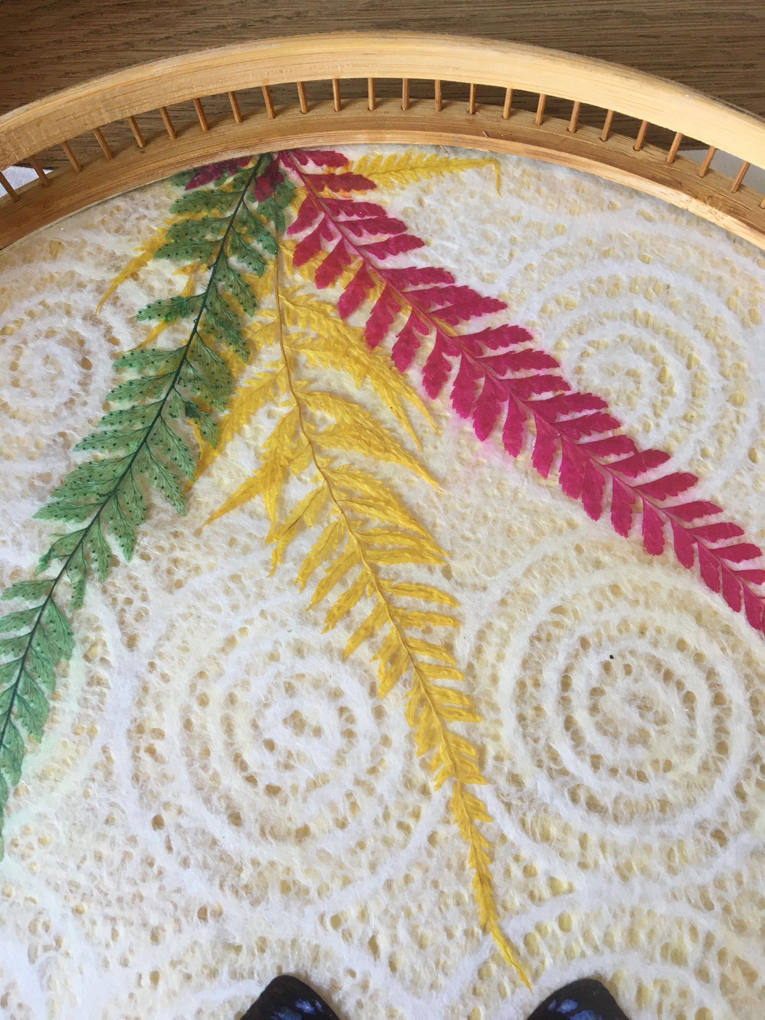 Vintage bamboo tray decorated with ferns and butterflies