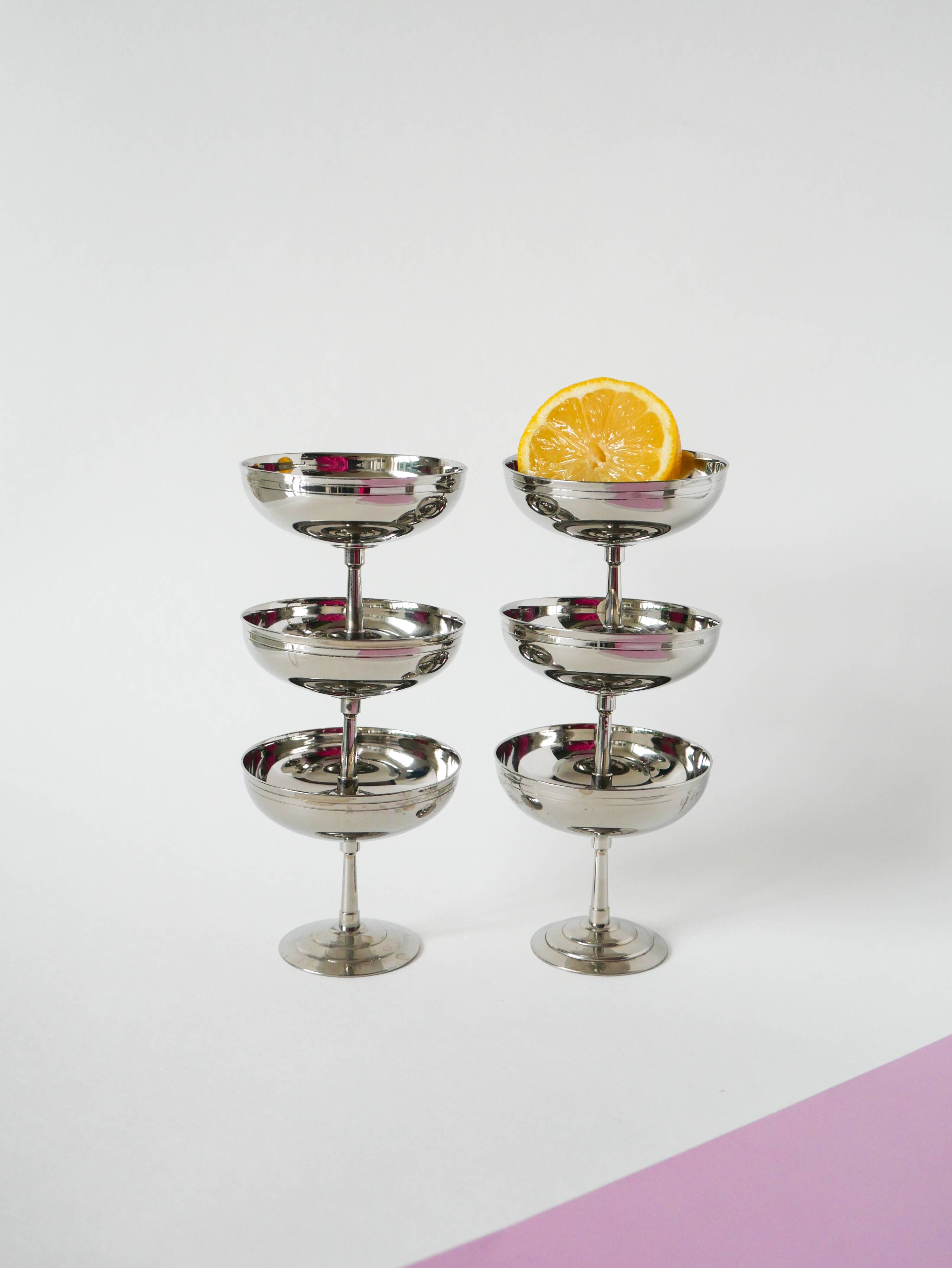 Set of 6 stainless steel bowls with fine feet, Design, 1970