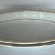 2 white porcelain ramekins