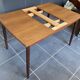 Extendable Scandinavian teak table by Johannes Andersen for Samcom Denmark.