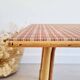 Table basse ancienne en rotin et motif tartan