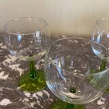 4 green stemmed glasses
