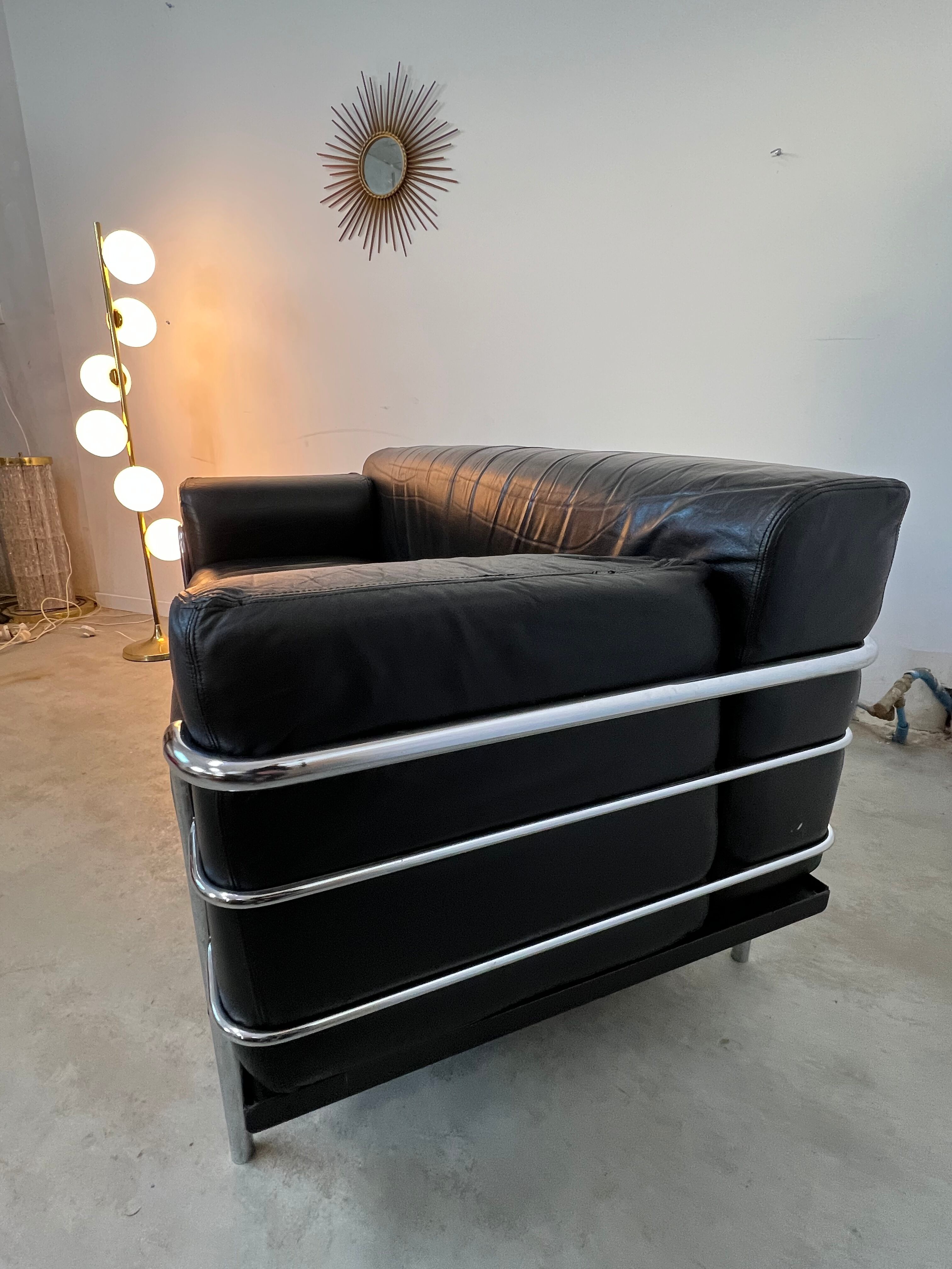 Old vintage leather and tubular metal sofa, design 70s