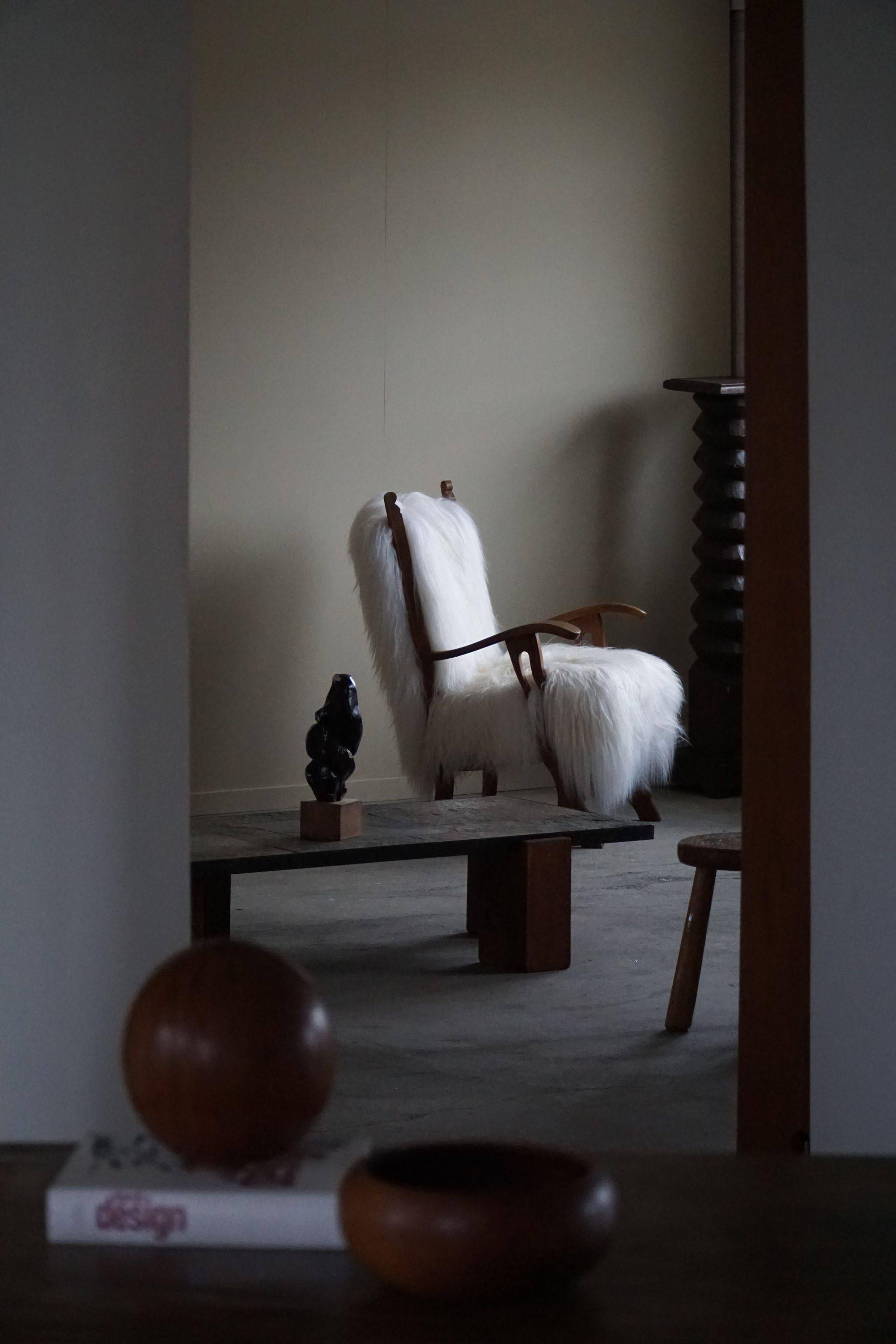 Henning Kjærnulf, armchair reupholstered in long-haired Icelandic sheepskin, 1950