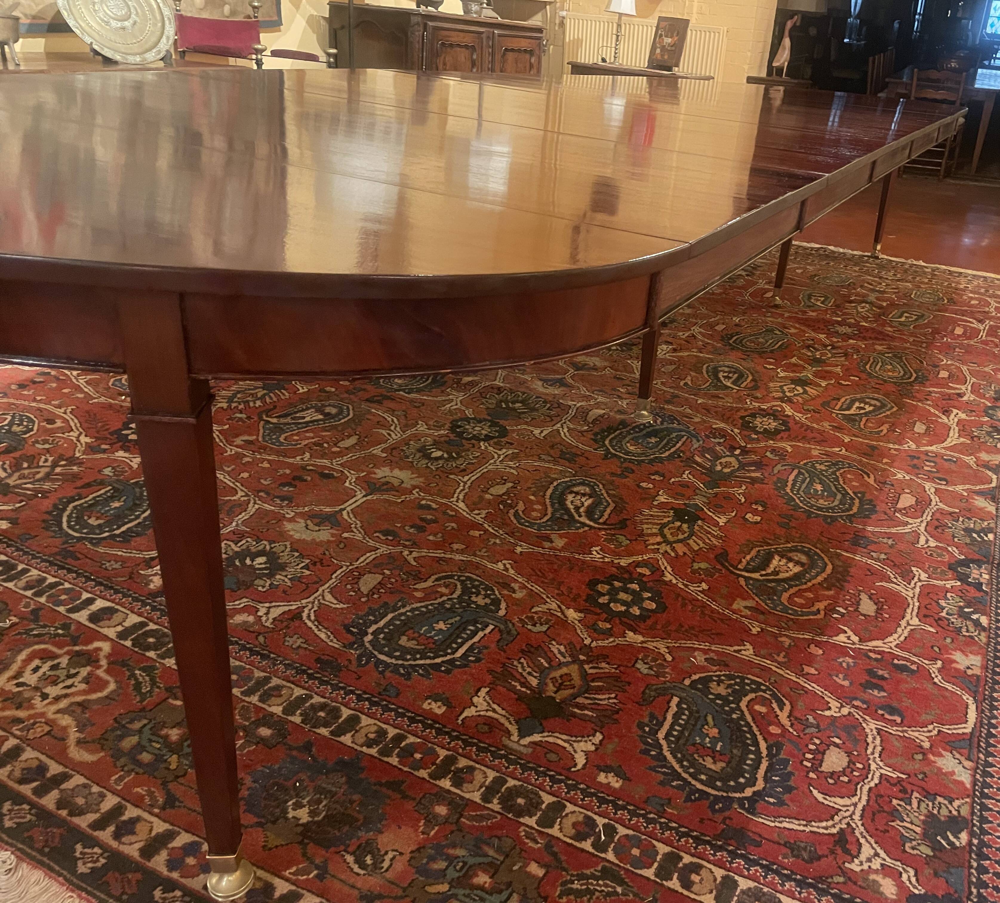 Extensible Louis XVI dining table in period Directoire mahogany.