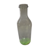 Old bottle of blown glass