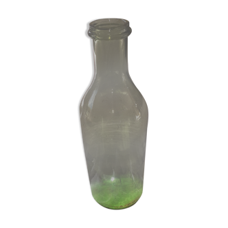 Old bottle of blown glass