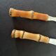Bamboo handle cheese knives.