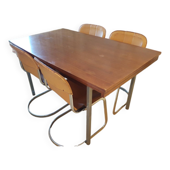 Rosewood table with 2 extensions, matching rosewood sideboard, chrome steel legs
