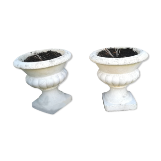 Pair of vases in reconstituted white stone