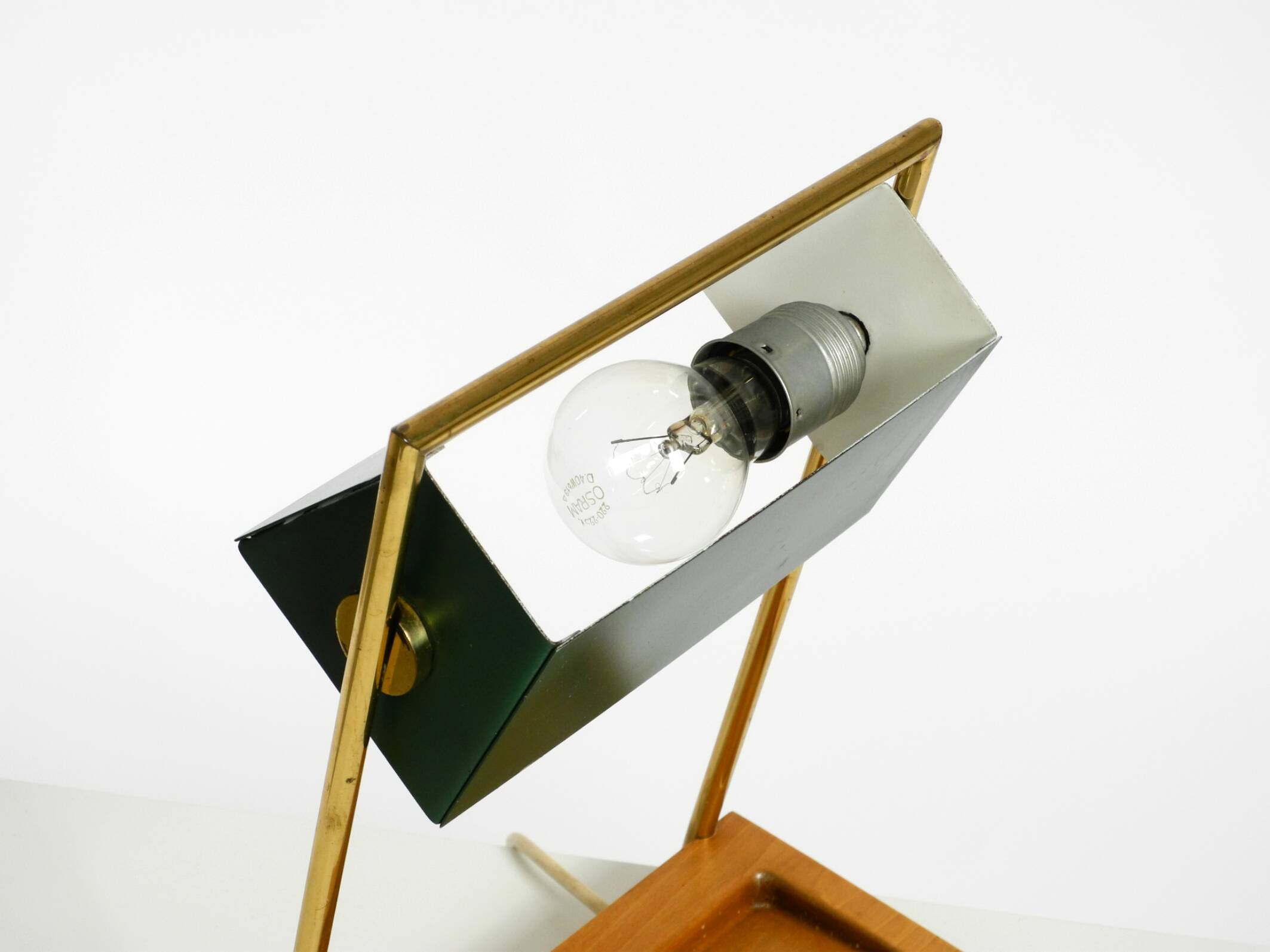 1960s Temde table lamp with a brass frame, teak base, and green lampshade