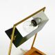 1960s Temde table lamp with a brass frame, teak base, and green lampshade