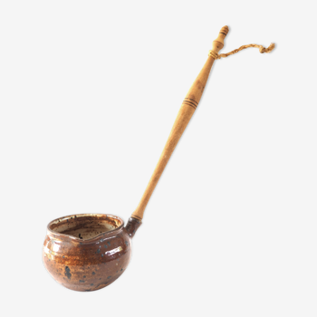 Old stoneware ladle