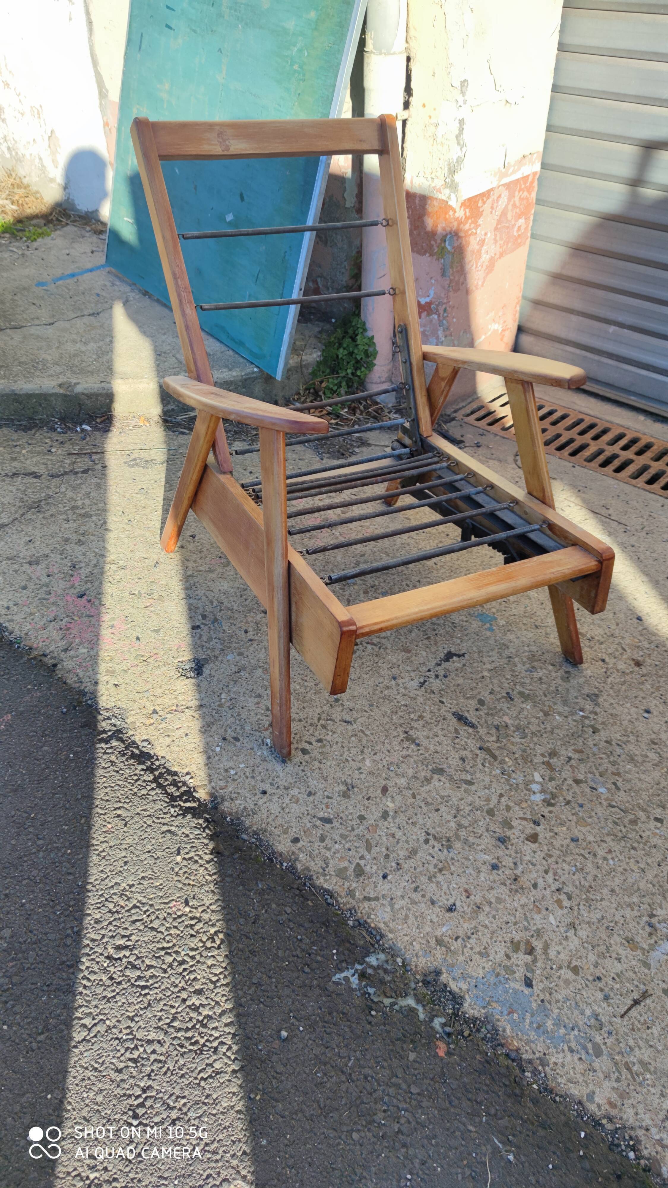 Armchair with compass legs and a mechanism, circa 1950