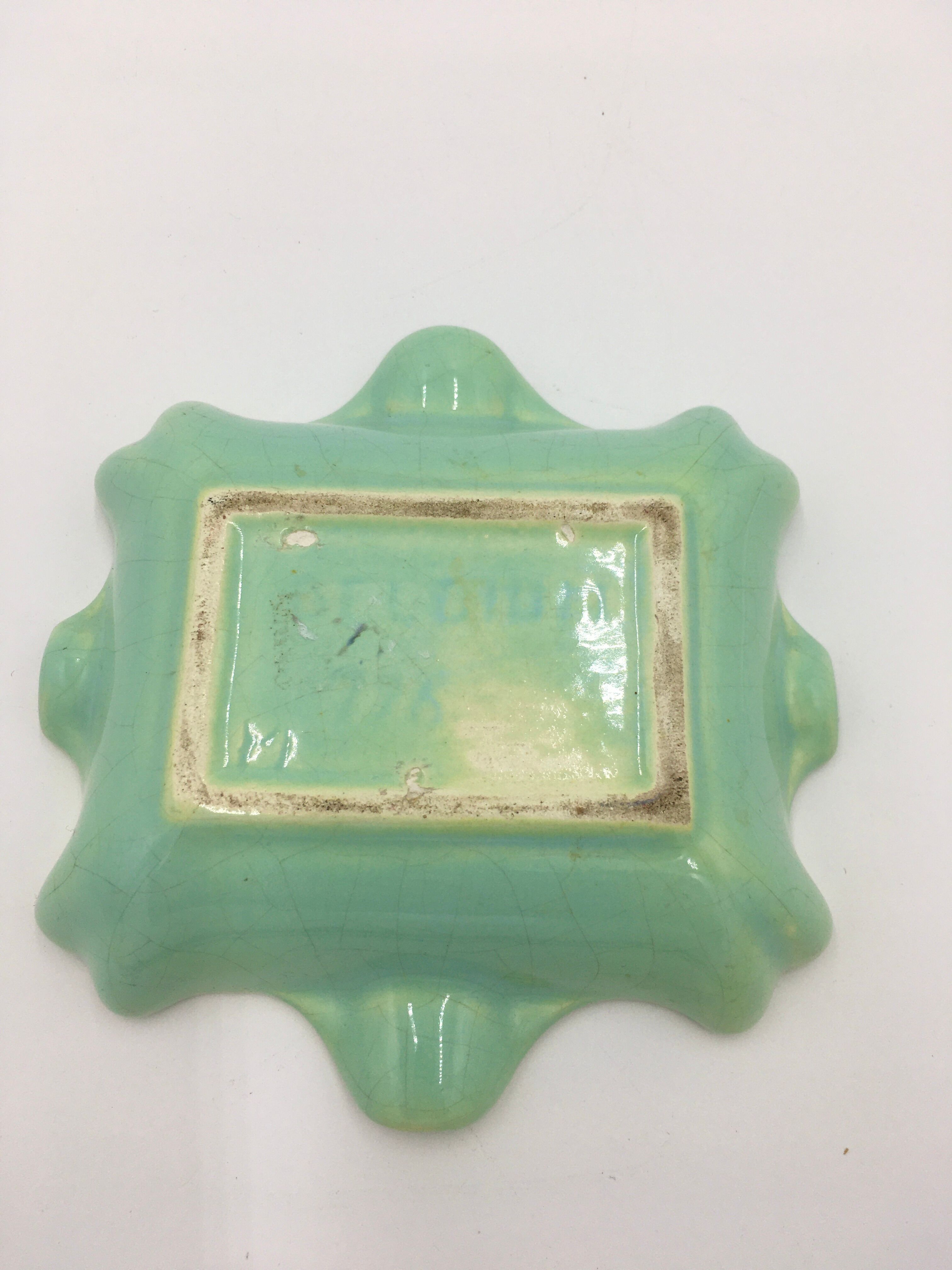 F.T. ceramic ashtray