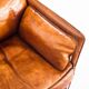 Vintage club armchair by Roche Bobois. Camel buffalo leather. France, 1980s.