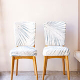 Pair of vintage chairs reupholstered with palm pattern fabric