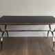 Table basse en acier brossé et laiton. Maison Jansen
