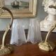 Pair of Art Deco wall sconces in frosted molded glass