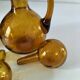 Duo of blown glass carafes – Biot signed – Bubbled amber glass