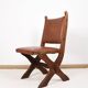 Pair of brutalist style chairs, in wood and leather.