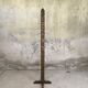 Vintage brutalist floor lamp made of turned wood.