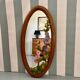 Miroir sculpté en bois décors fleurs