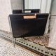 Vintage Brabantia magazine rack in black leather