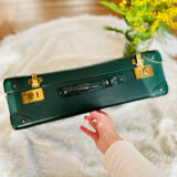 Dark green vintage cardboard suitcase