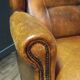 Robust vintage sheepskin armchair