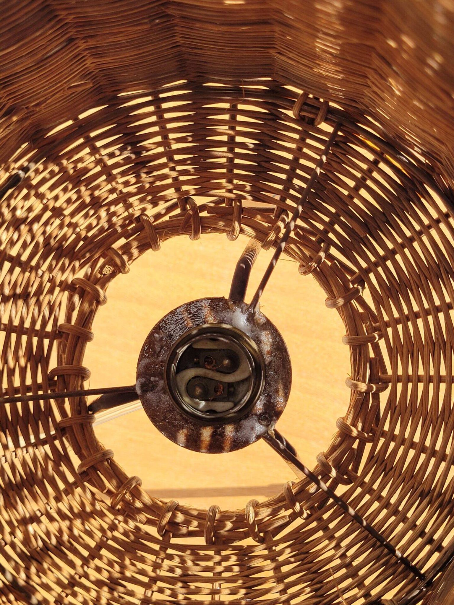 Tripod lamp and rattan from the 1950s.