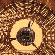 Tripod lamp and rattan from the 1950s.