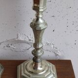 Paire de bougeoirs anciens en métal argenté