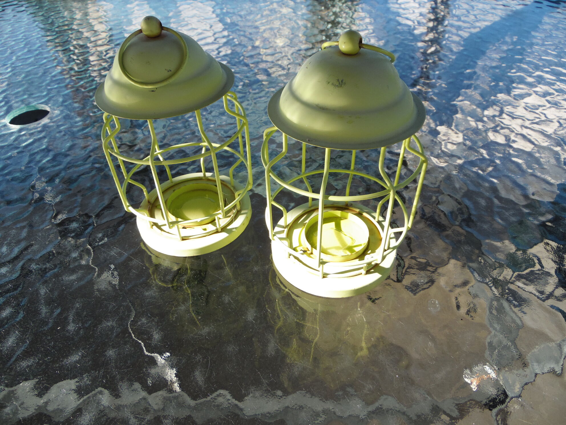 Duo of small metal lanterns