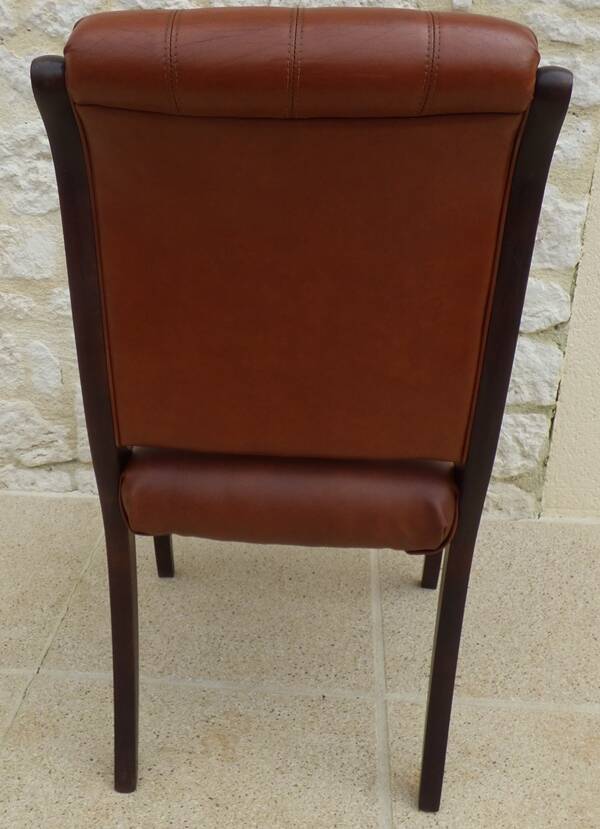 Chic Vintage Chesterfield style chair with wooden frame and faux leather