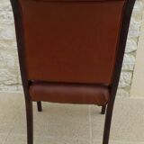 Chic Vintage Chesterfield style chair with wooden frame and faux leather