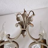 Pair of sconces in patinated metal and crystal tassels